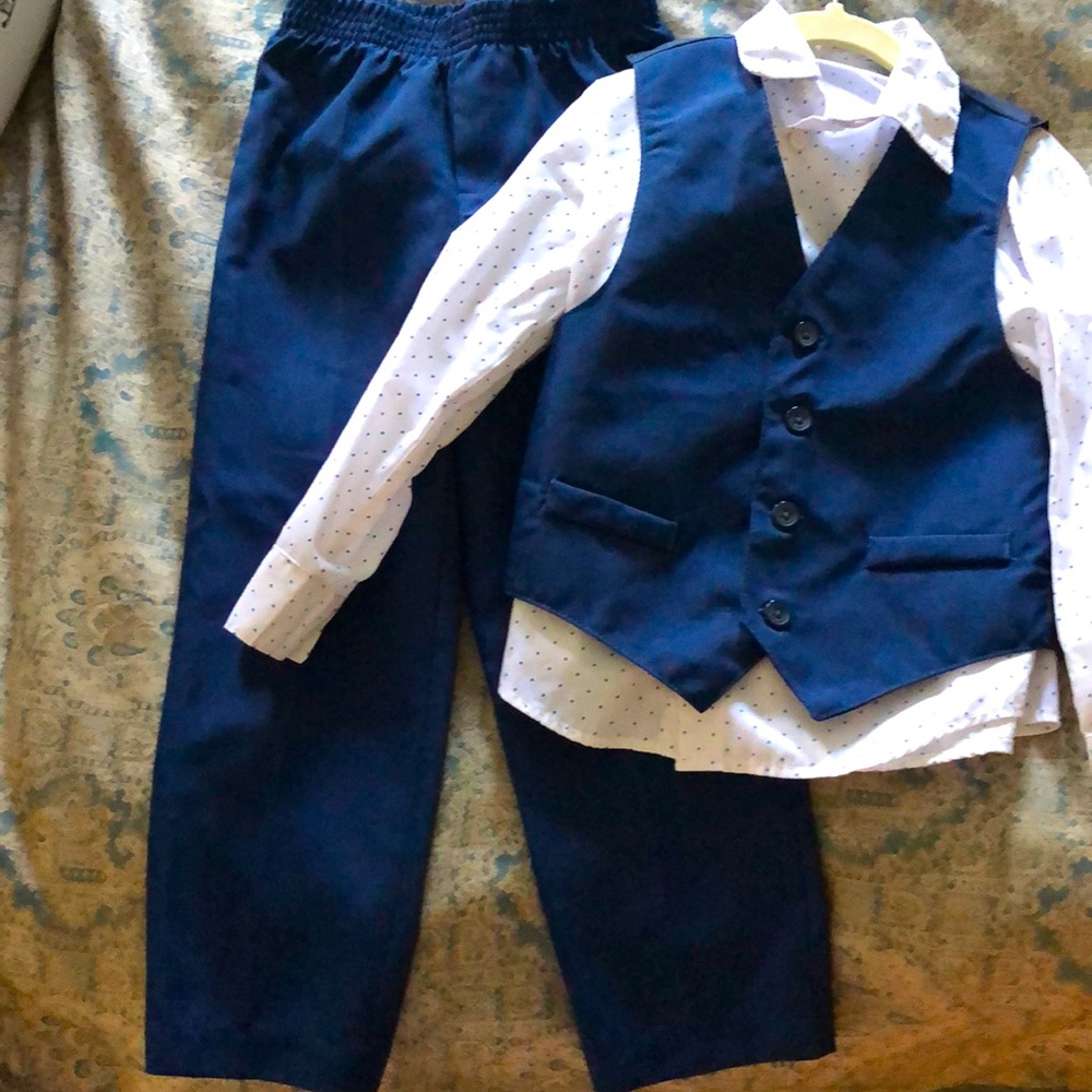 3 piece boys suit with pants, shirt and vest.